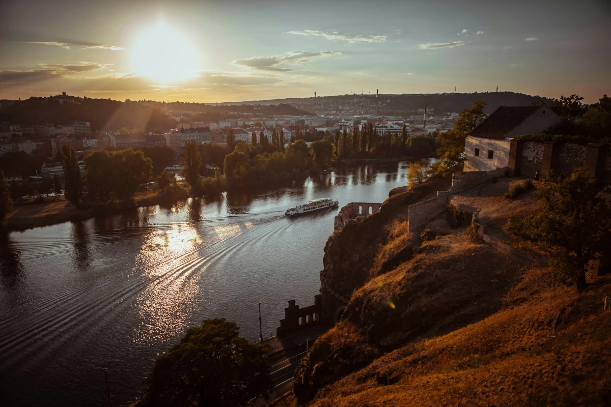 Take a river cruise or stroll along the Vltava in Prague