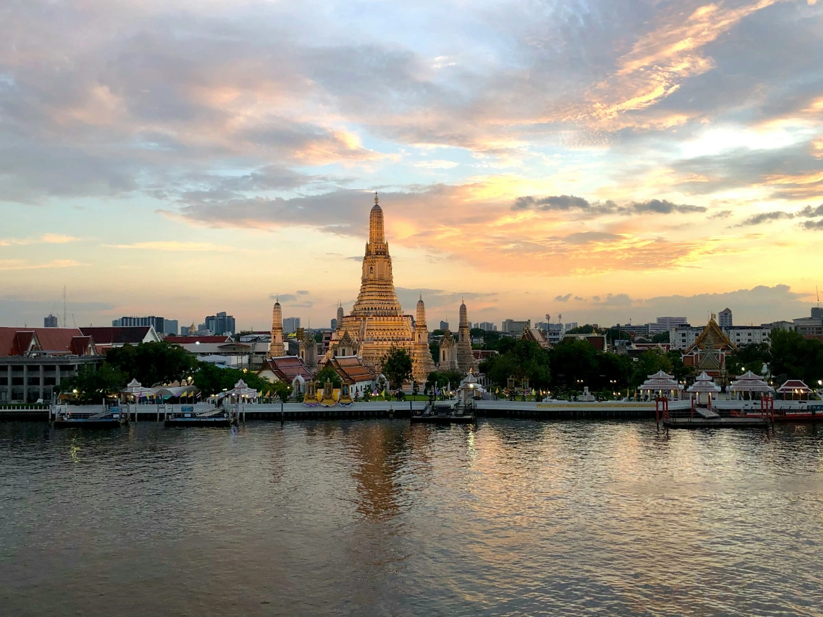 Catch sunset drinks on a rooftop overlooking the Chao Phraya River in Bangkok