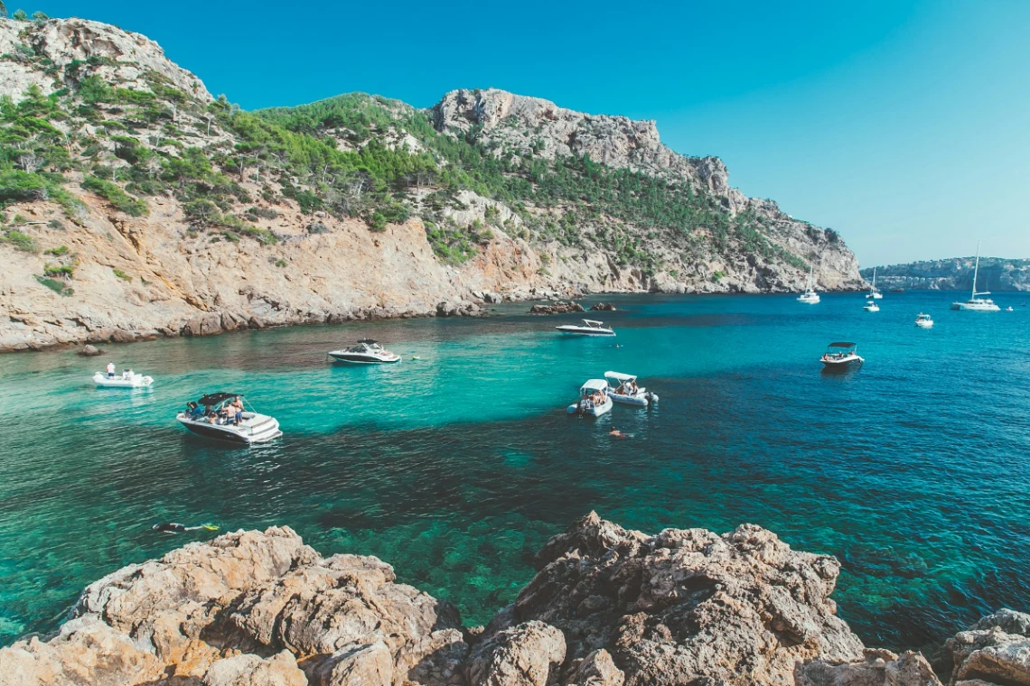 Relax on a hidden cove or a sandy beach like Es Trenc in Mallorca