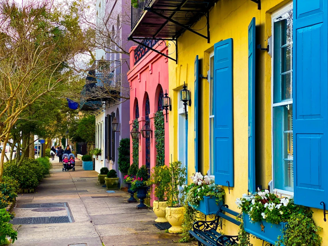 Photograph Rainbow Row and nearby historic homes in Charleston